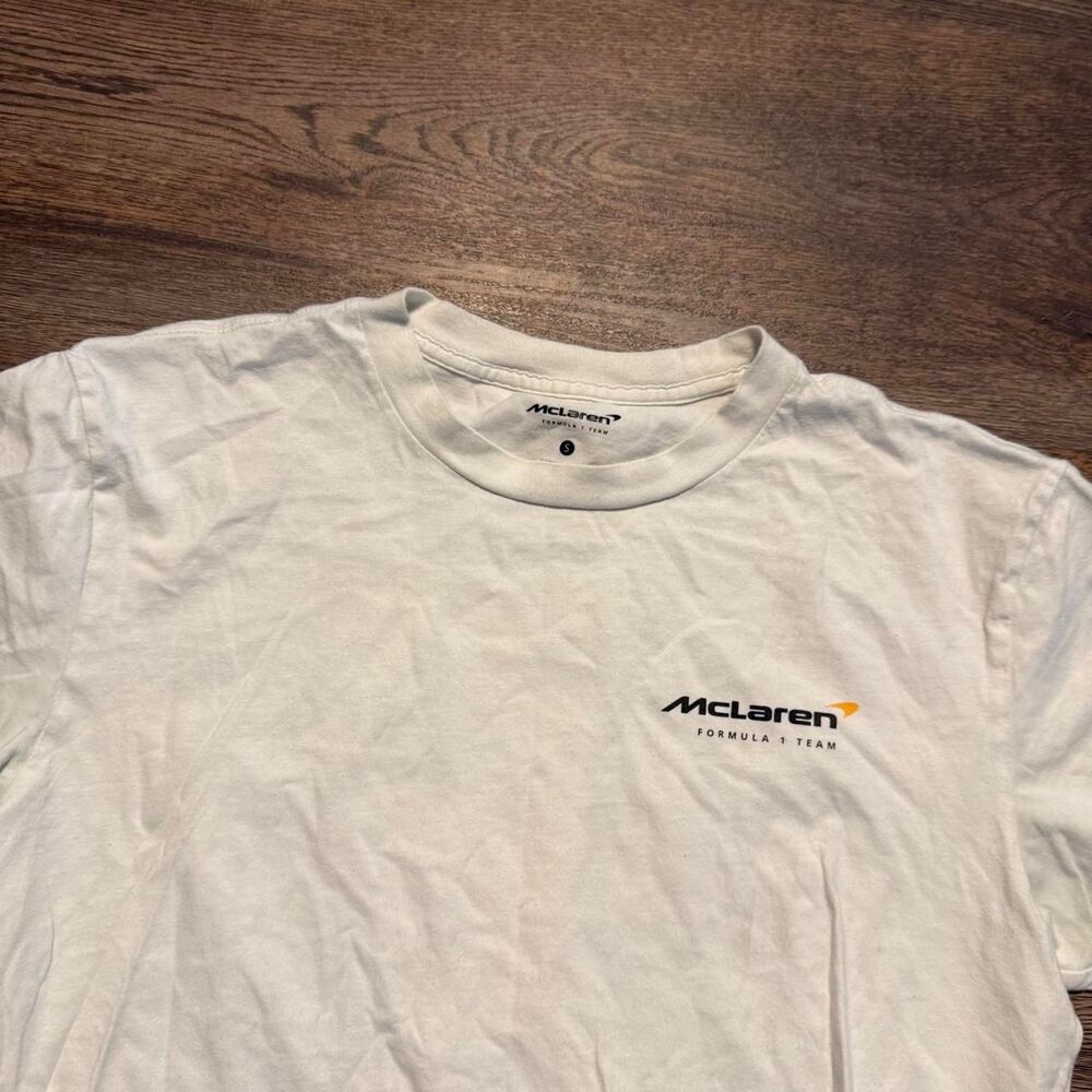 McLaren F1 2023 white t-shirt with orange/black race car graphic and checkered f - Picture 5 of 6